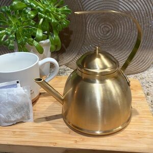 SOLD. Luxurious Gold Teapot with Curved Handle